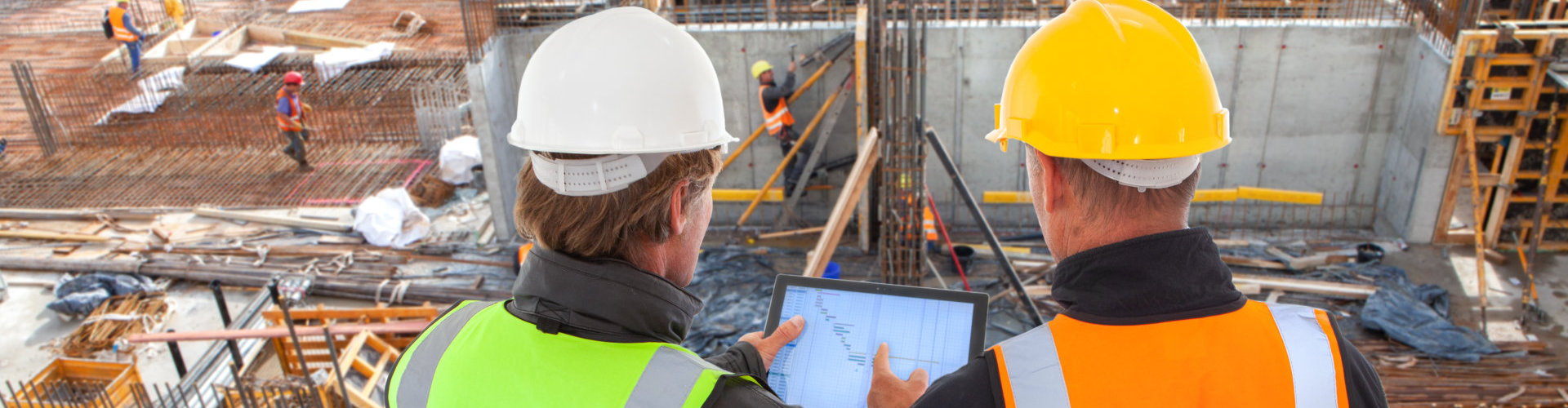 two engineers checking the site